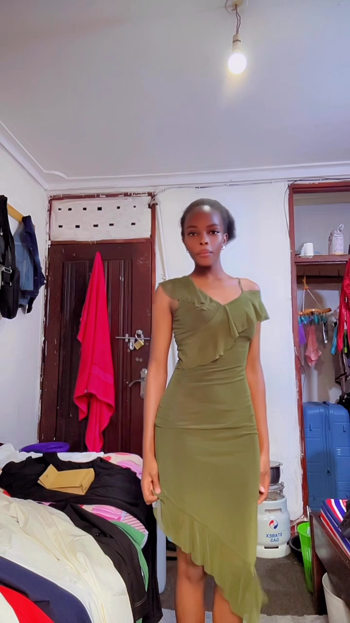 Original video reference of the olive dress in the shop